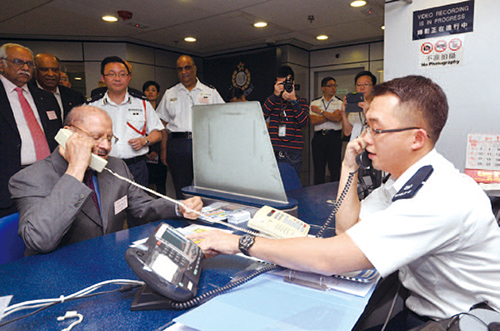 Kowloon West Region rolls out TRANSLINK, a trial project to provide instant telephone interpretation services for the NEC community members making reports to report rooms. 