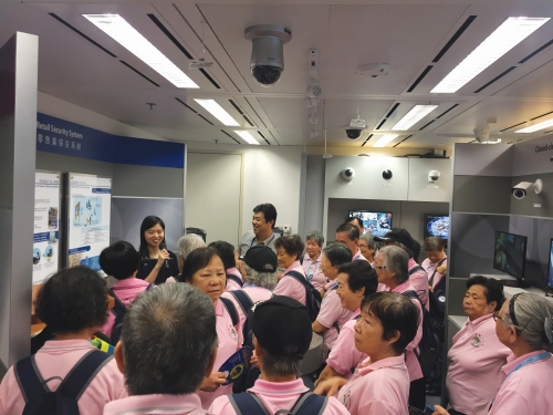 Senior Police Call members pack the Crime Prevention
Bureau Display room on their visit.