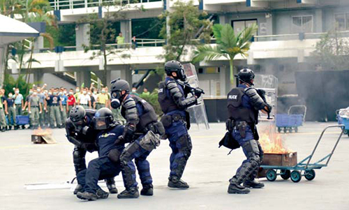 Officers of the Special Tactical Contingent receiving regular training.