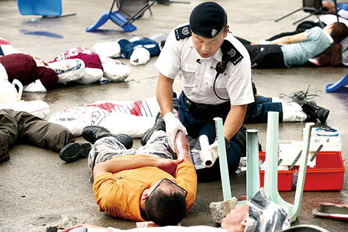 Emergency Unit New Territories North officers taking part in an inter-departmental exercise simulating a major incident.